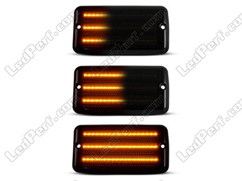 Lighting of the black dynamic LED side indicators for Jeep Wrangler II (TJ)